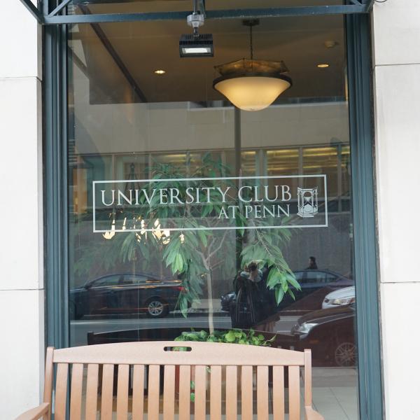 University Club logo on window